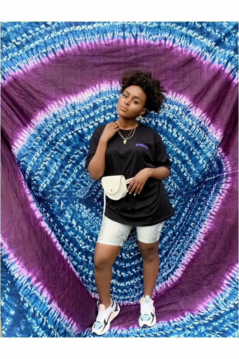 black unisex tee with African proud written in purple 