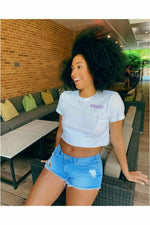 white unisex tee with African proud written in purple 